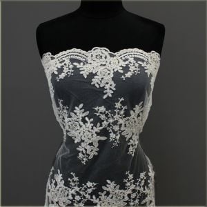 A Floral Bridal Embroidery Scalloped with Sequins on a Mesh Wedding Lace Fabric